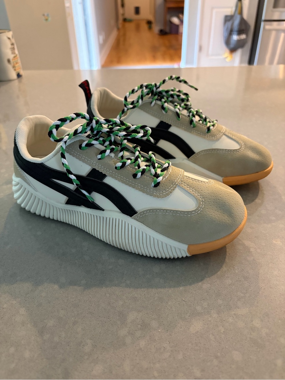 Women's Cream Low-Top Sneakers with Black Accents and Green-Pattern Laces